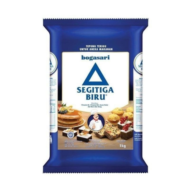 

Tepung Bogasari Sigitiga Biru Polos Premium Cakra Kembar Lencana Merah
