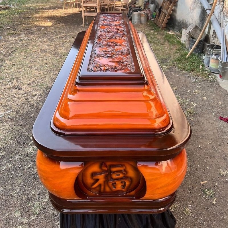 peti jenazah bulat ukiran delapan dewa