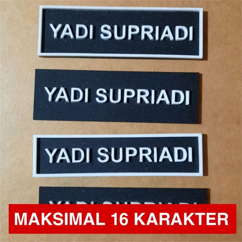 

Name Tag Akrilik Timbul | Dasar: Hitam - Tulisan dan Lis: Putih | Papan Nama Dada PDH | nararya id
