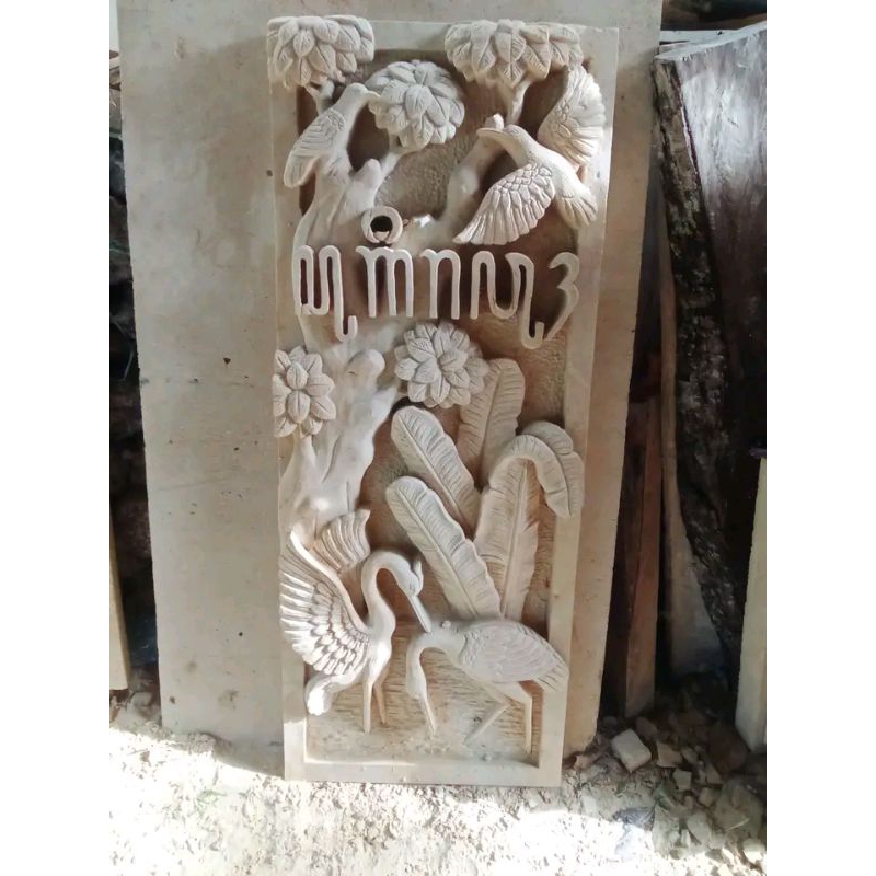 batu paras hiasan dinding relief