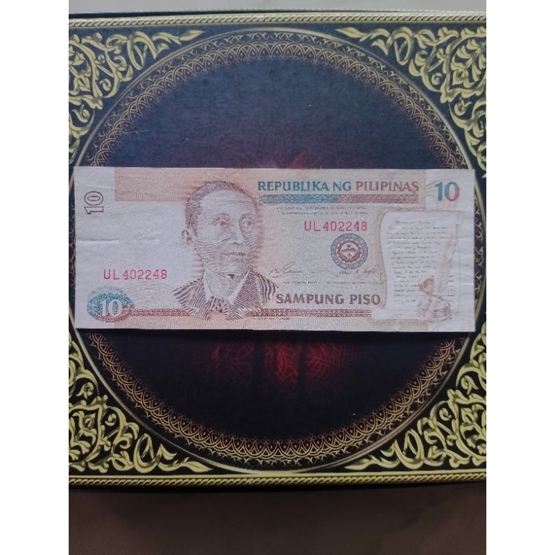 Uang Pilipina 10 piso vf sobek