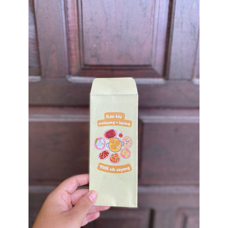 

amplop ikan hiu melayang layang