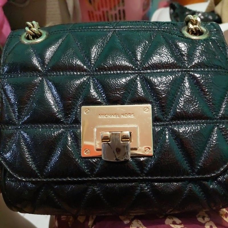MK Sloan small preloved