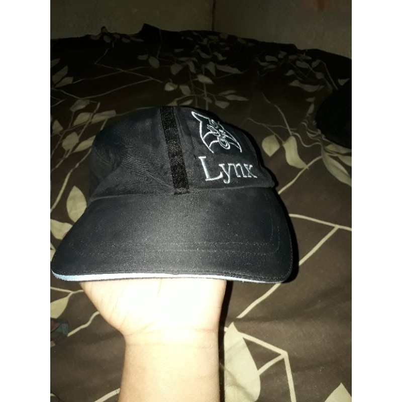 Topi golf second hand