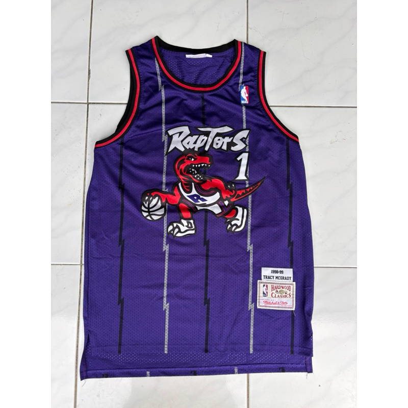 Maillot Basketball Tracy McGrady – Toronto Raptors, Mitchell & Ness, Taille L