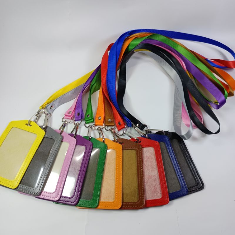 

TEMPAT ID / CARD HOLDER KULIT SINTETIS PLUS LANYARD LEBAR 1,5 CM