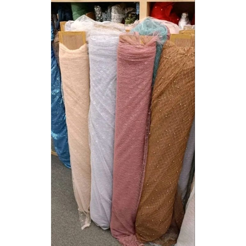 kain renda tile mutiara