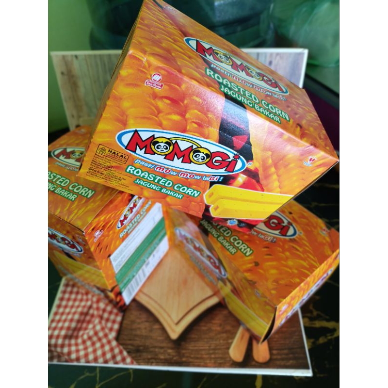 

MOMOGI JAGUNG BAKAR 1 BOX ISI 10 PCS/12 GRAM/MOMOGI STICK SNACK EXTRUDATLONG-ISI 10 BGKS seharga Rp10000