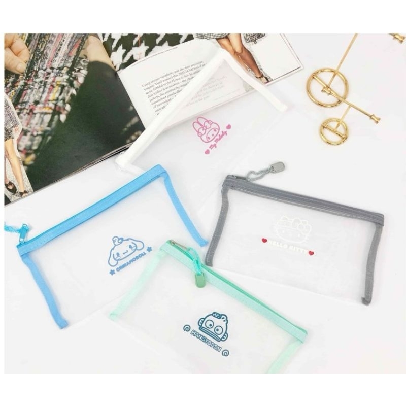 

Tempat Pensil /Dompet Motif Kepala Sanrio