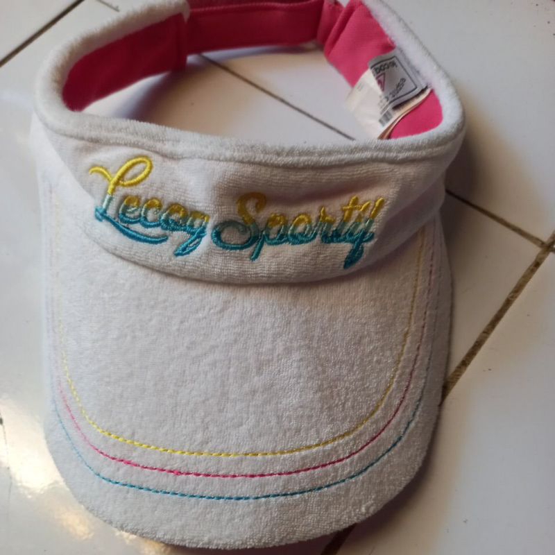 topi golf le coq sportif