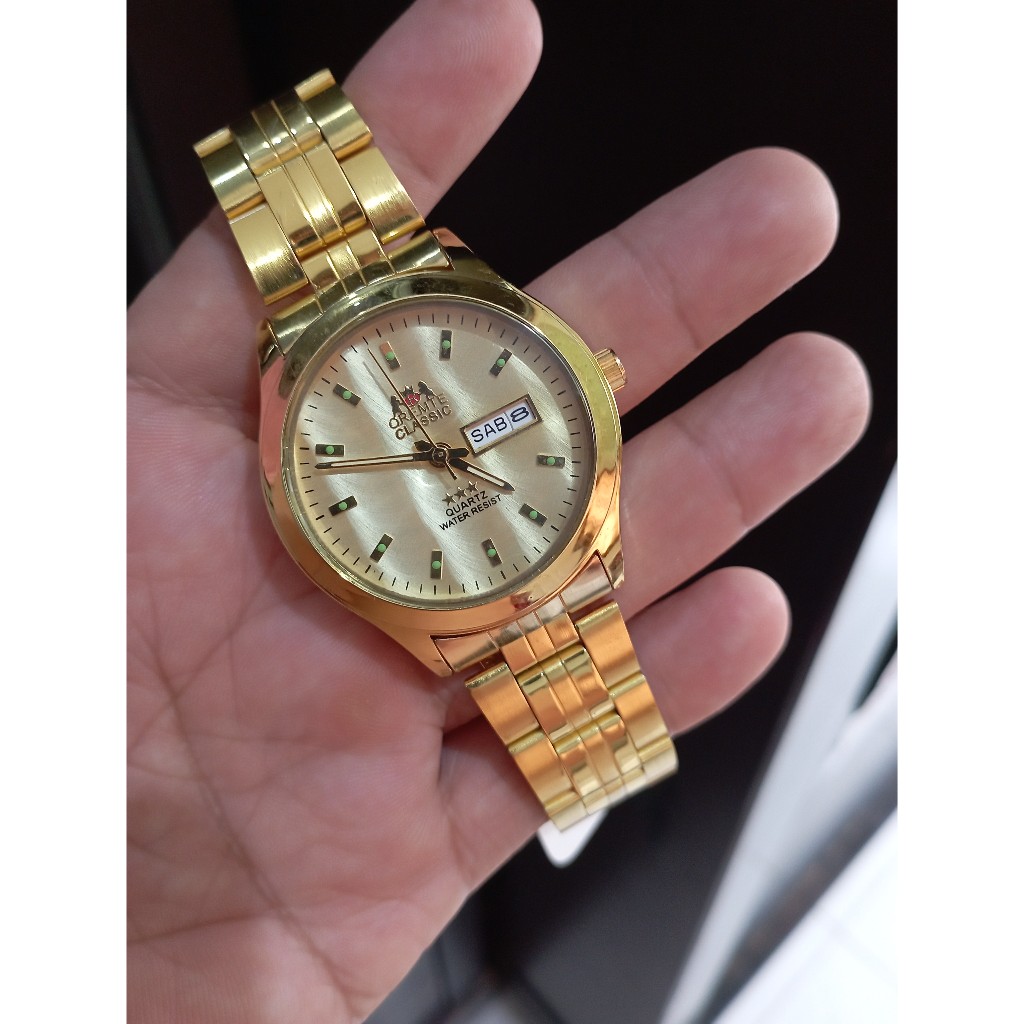 jam tangan pria gold klasik stenlis steel day date elegant gold oremte