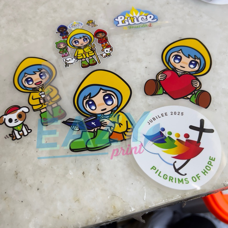 

STIKER SABLON SETRIKA DTF LOGO YUBILEUM 2025 LUCE AND FRIENDS YUBELIUM JUBILEE FE SKY XIN KAOS BAJU TAS