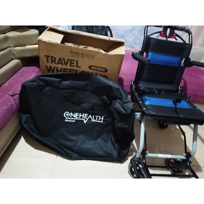 sewa kursi roda traveling handle