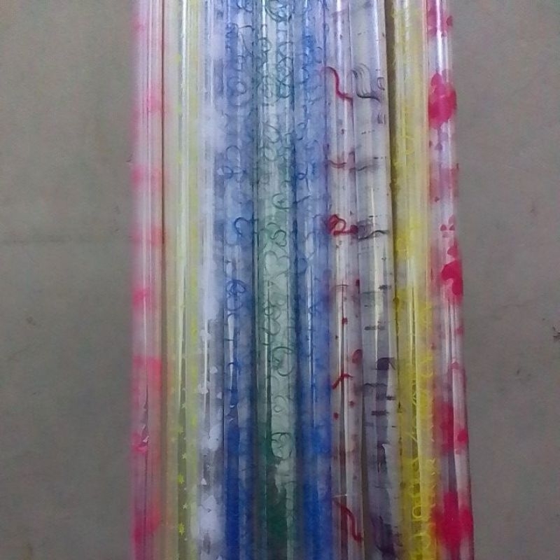 

KEMASAN PLASTIK KADO BENING CORAK WARNA 10 ROLL