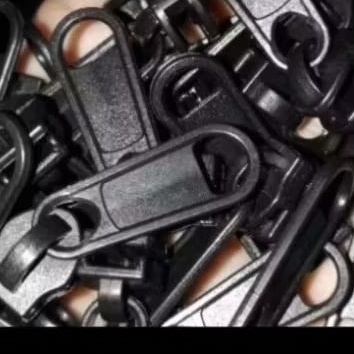 Kepala seleting plastik coil no 3,kepala resleting plastik koil no 3 dipakai dengan daun resleting k