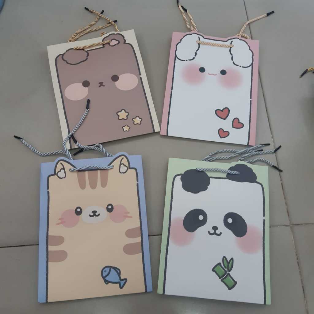 

paper bag kecil vertikal motif - UK [18X10X23]