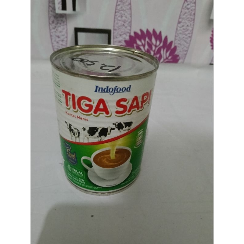 Susu Kaleng tiga sapi.