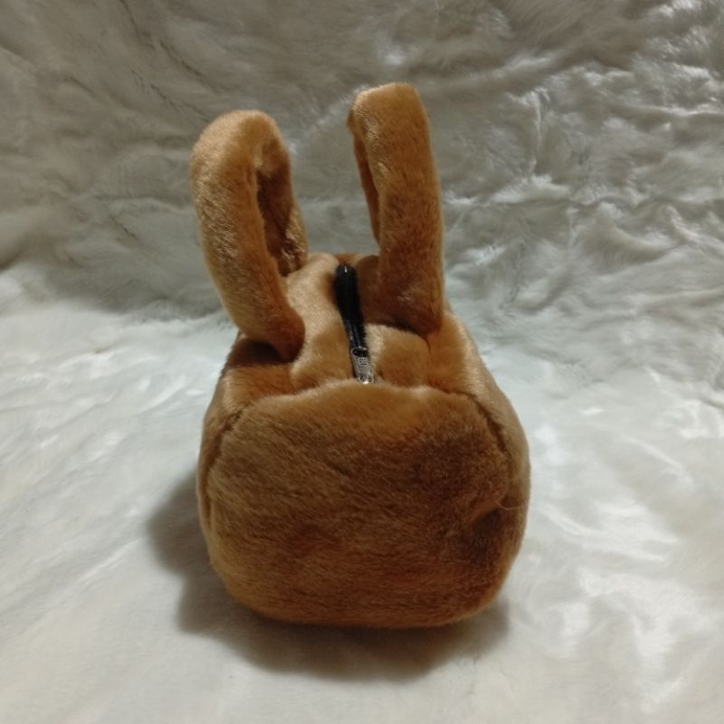 tas kosmetik wanita bahan bulu halus