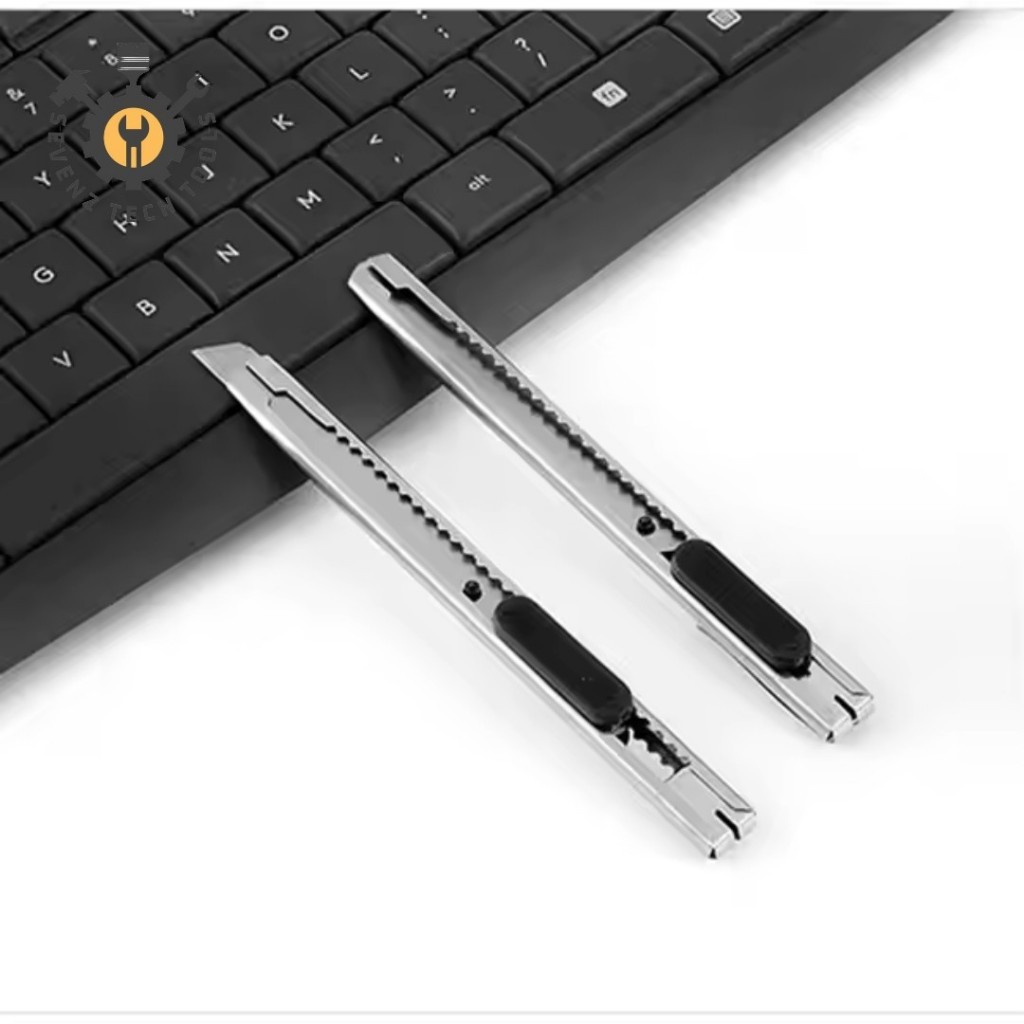 

CUTTER PISAU KATER KUTTER MINI SILVER STAINLESS STEEL PEMOTONG SERBAGUNA PEMOTONG KERTAS PACKING