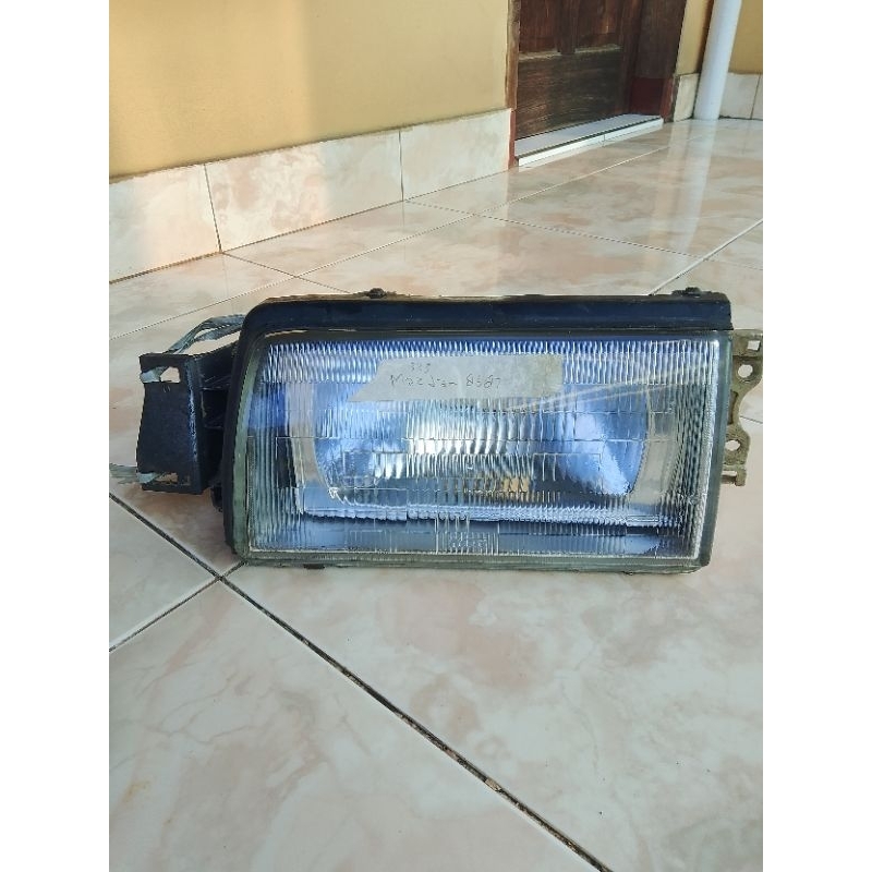 lampu depan Mazda 323 1986/1987(kiri)