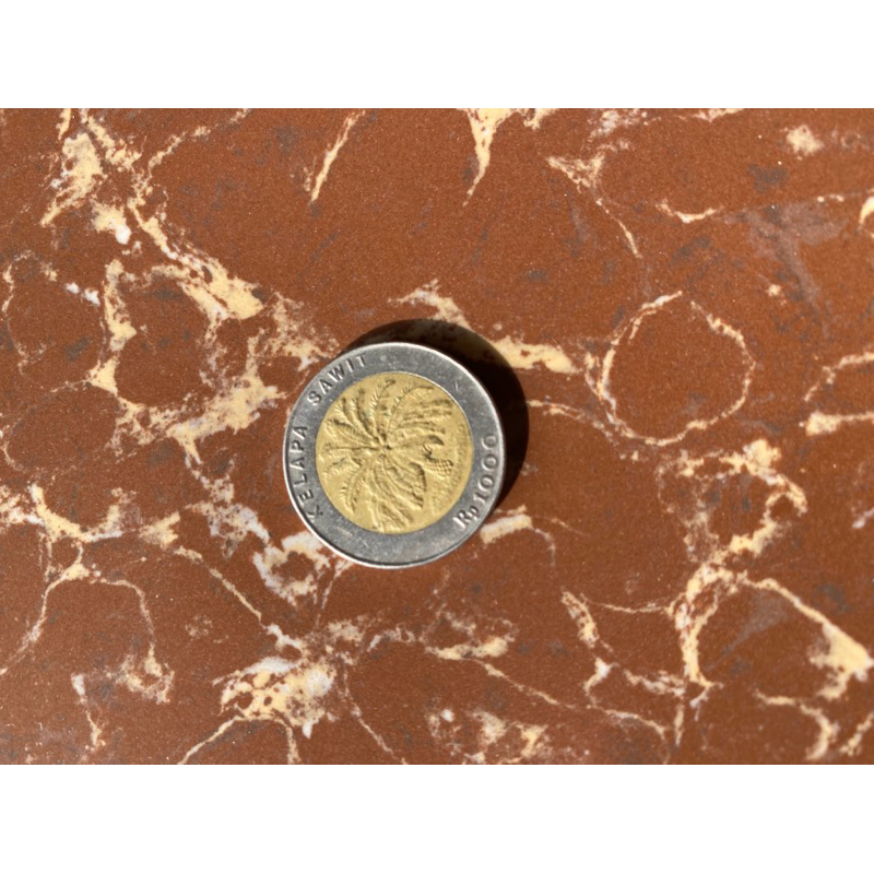 Uang Kuno 1.000 Rupiah kelapa sawit