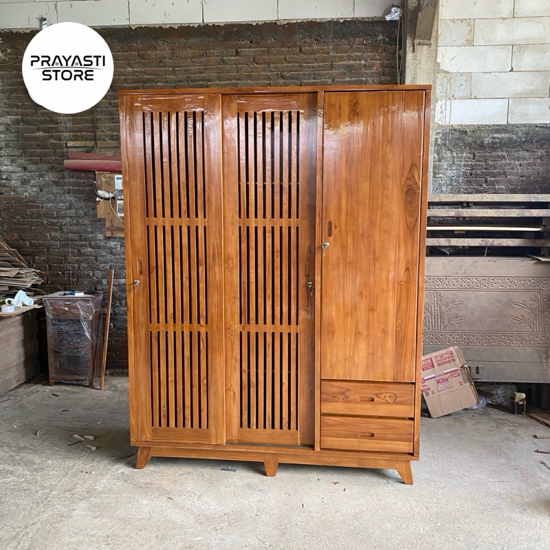 Lemari pakain minimalis 3 pintu jati Lemari pakaian 3 pintu sliding kayu jati