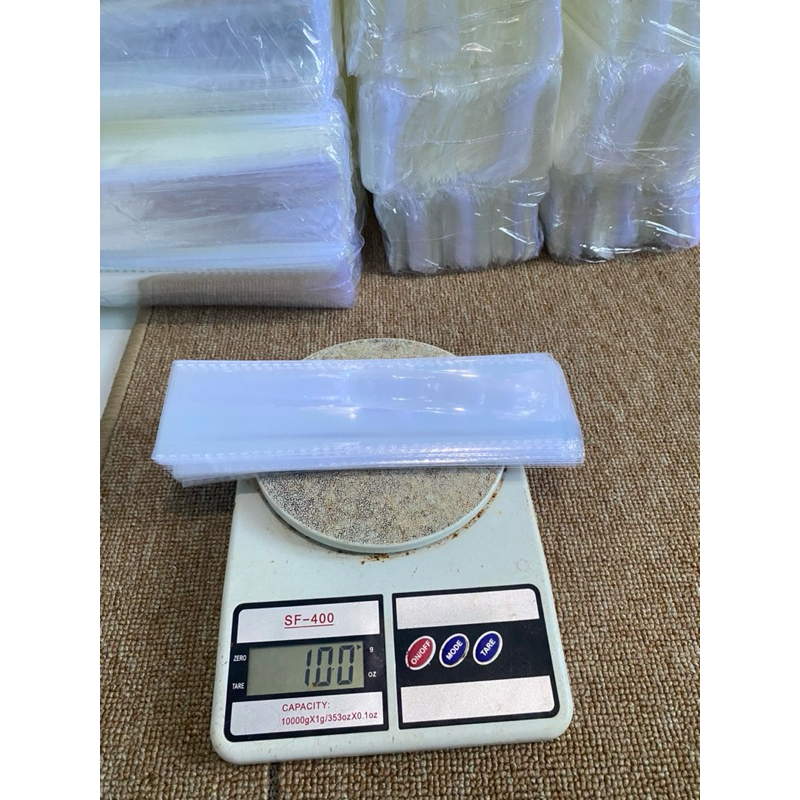 

Plastik OPP double press 100gr isi -+ 110 lembar plastik aida snack