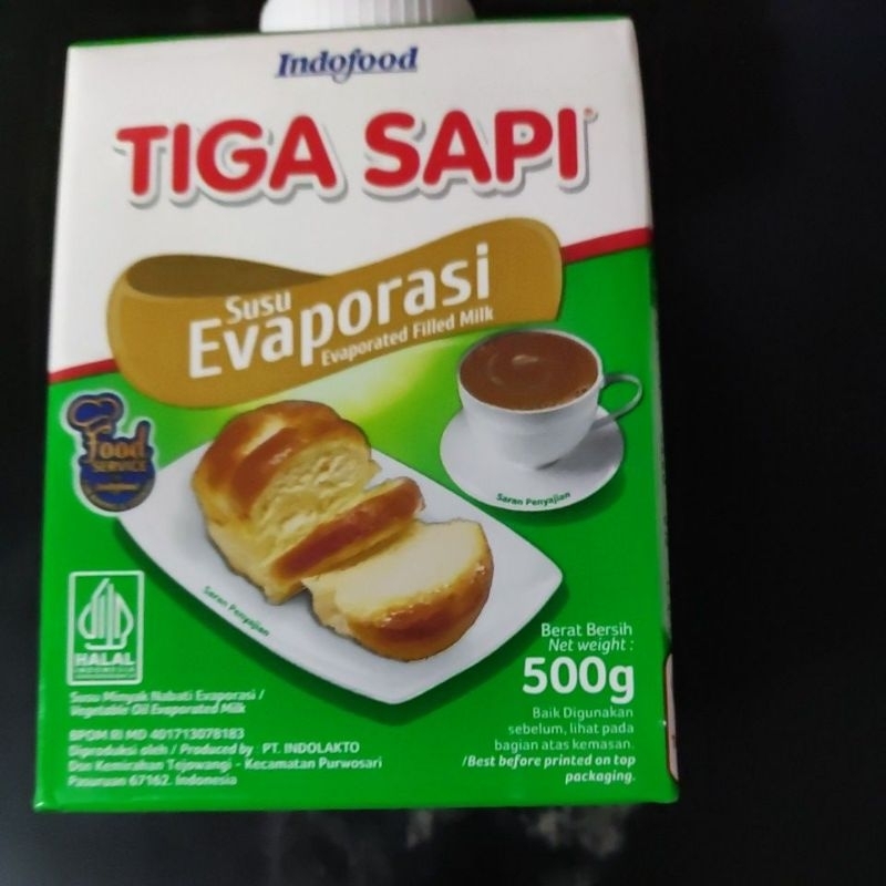 

Susu evaporasi cap tiga sapi