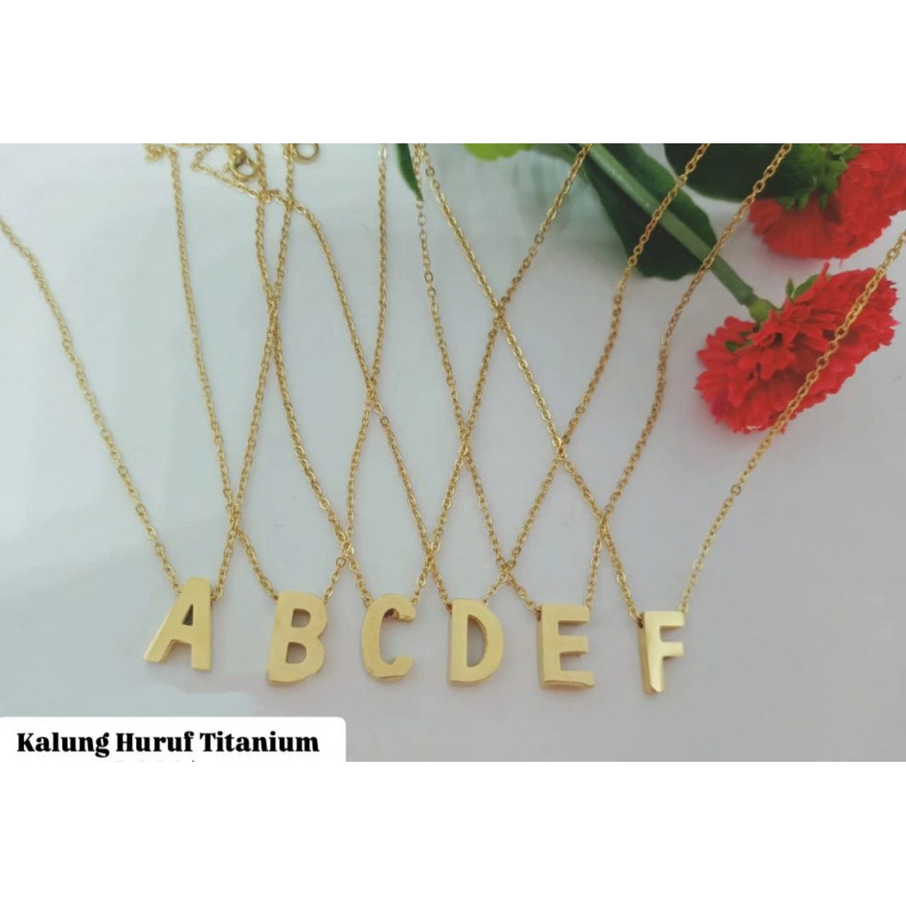 kalung Huruf titanium kecil
