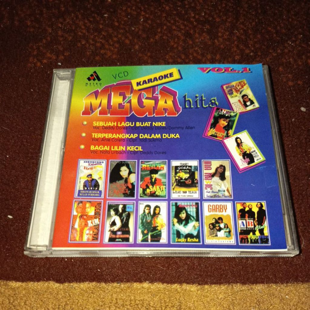 VCD MEGA HITS VOL 1 SEBUAH LAGU BUAT NIKE ARDILLA DEDDY DORES KIN BAND NAFA URBACH GARBY AB CLUB ANI