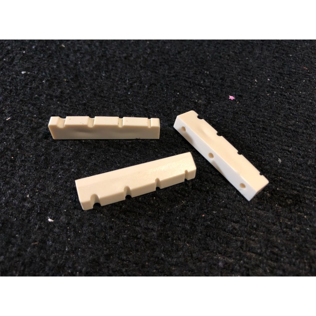 Nut Gitar Bass Senar 4 Bahan Plastik