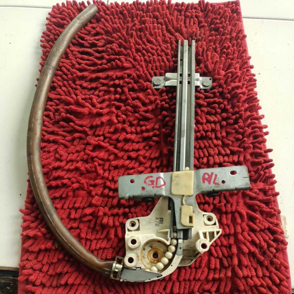 Regulator power window Mazda 626 Capella belakang kanan original