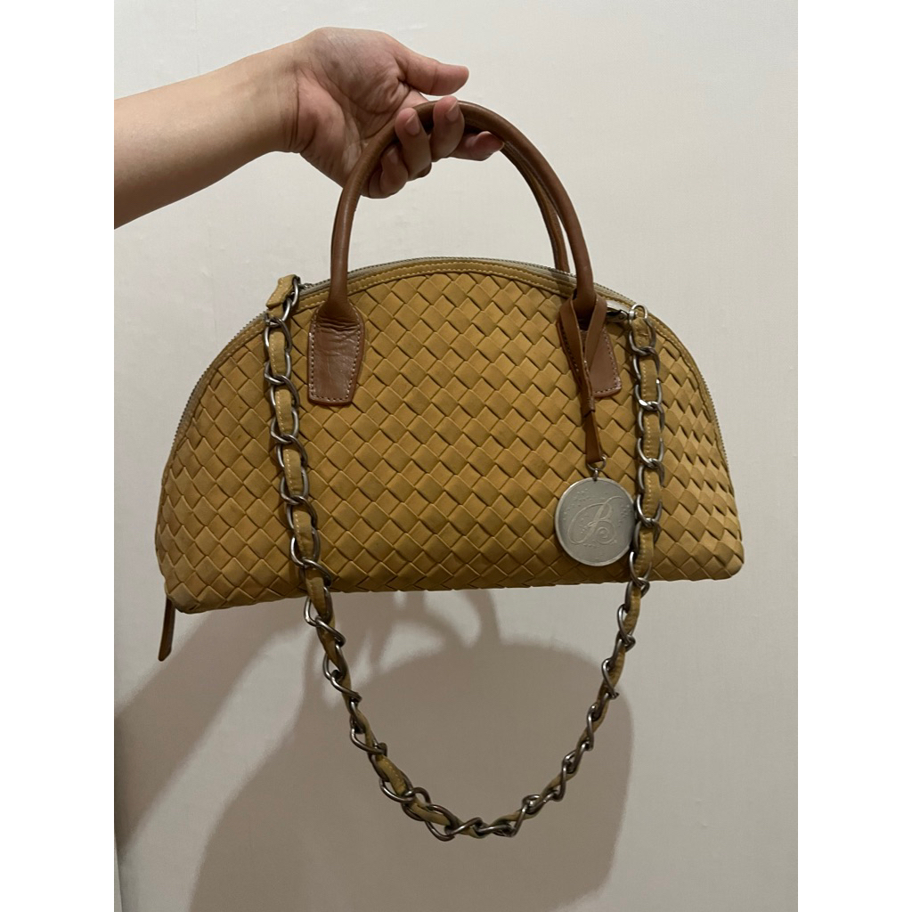 Tas Wanita anyaman ala bottega veneta