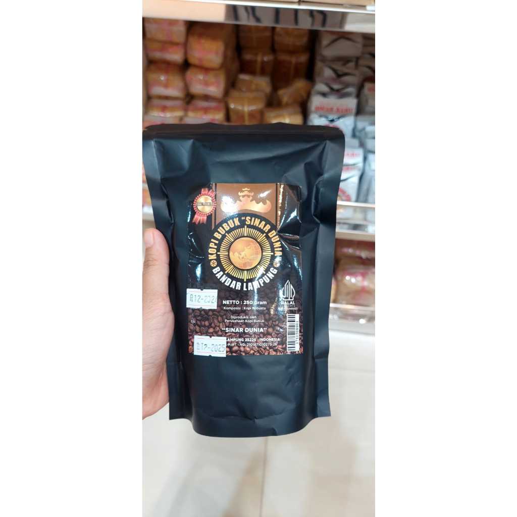 

Kopi bubuk Sinar dunia cap Bola Dunia Asli Lampung berat 250 gram ( Robusta)