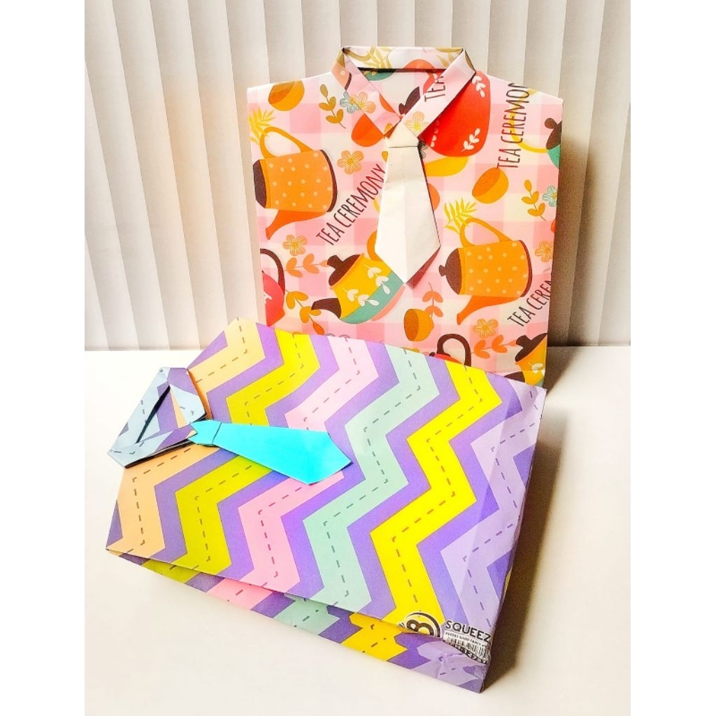 

Bungkus kado instan model baju ukuran sedang