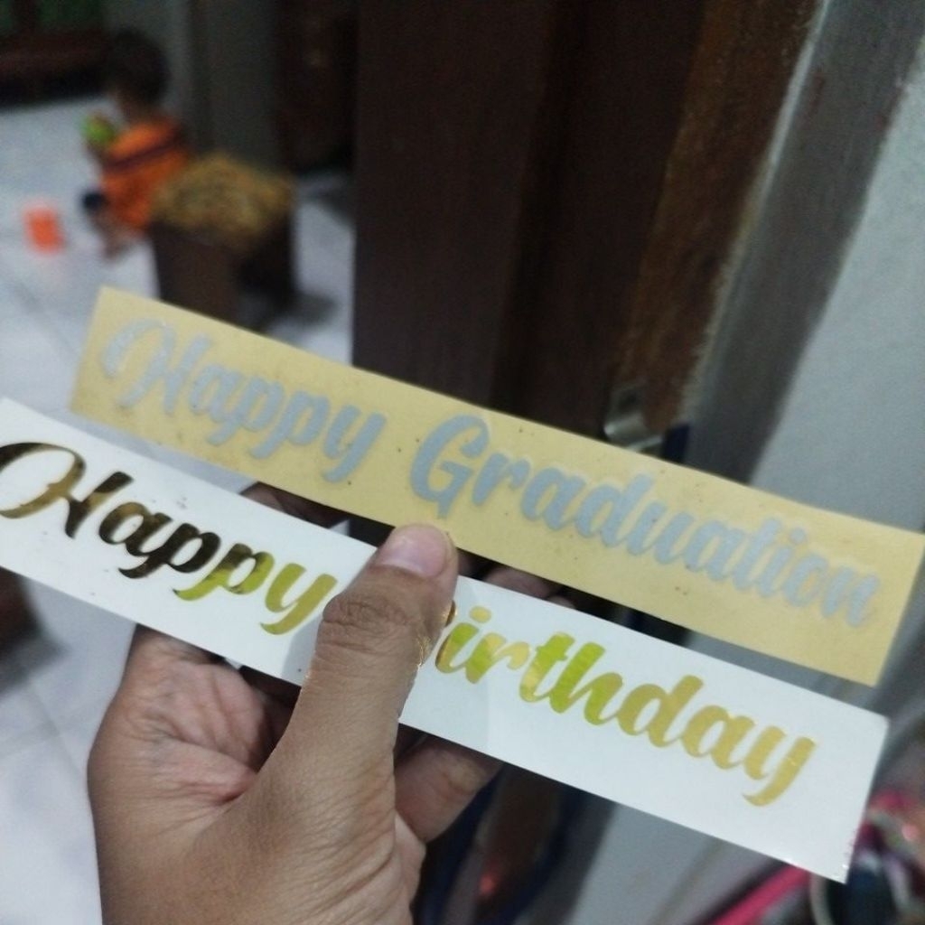 

Add tulisan stiker tempel di pita