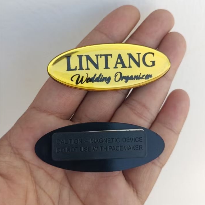 

Nametag Papan Nama Oval 6,5x2,5cm ABS Gold Silver Lapis Resin Name Tag
