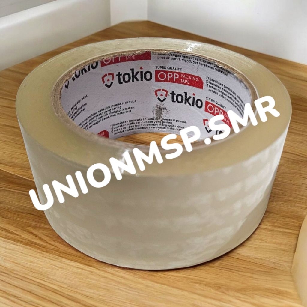 

TOKIO - Lakban Bening 48mm x 100 Yard | Isolasi Bening Kuat | Lakban Packing Kardus Plastik 2 Inch