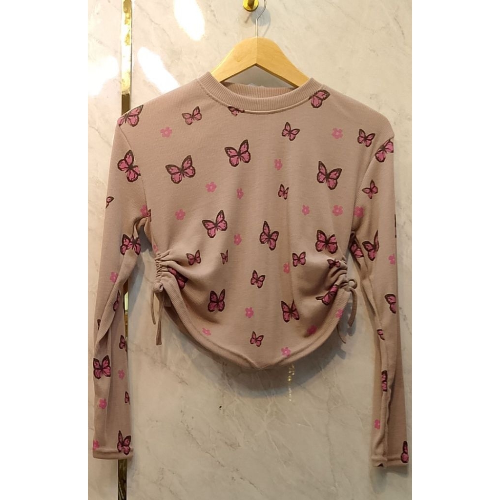 crop tali serut samping