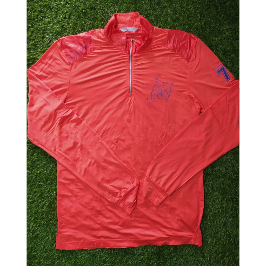 baju golf lynx