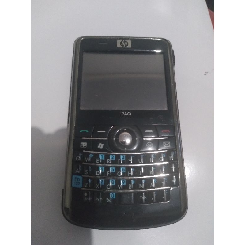 HP hand phone. mobile phone. hewlett packard. rusak mati total