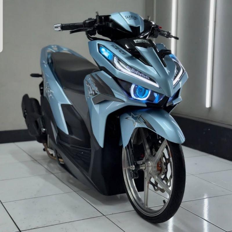 cat motor warna biru relaxa