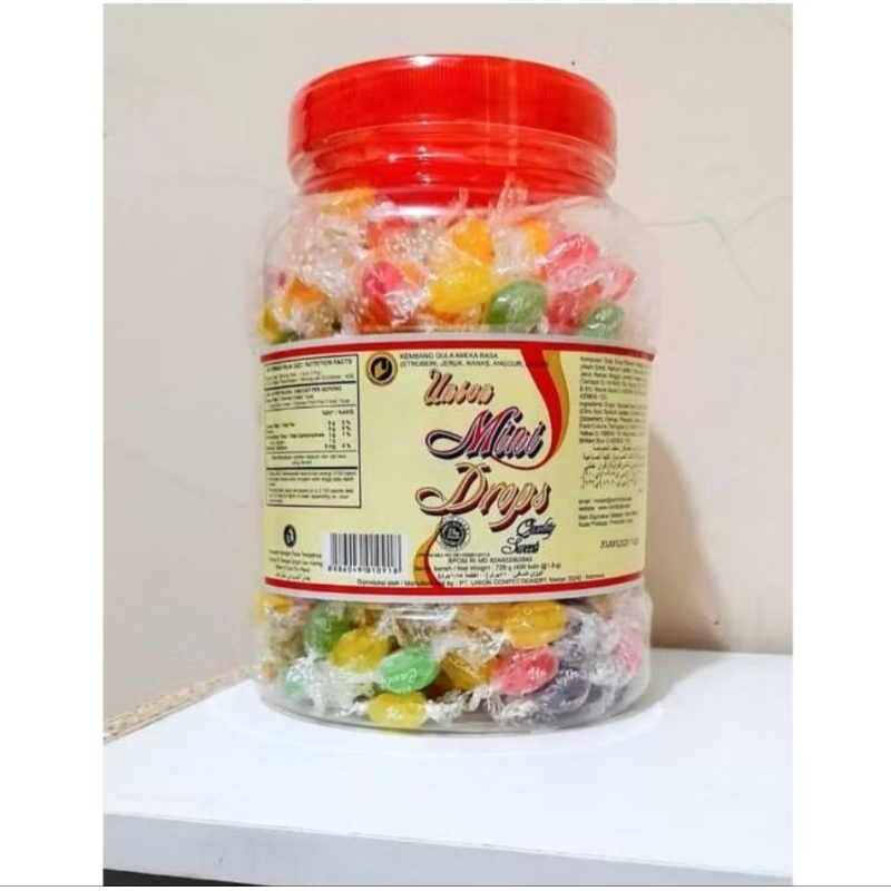 

PERMEN TOPLES UNION MINI DROPS ISI 400 BUTIR