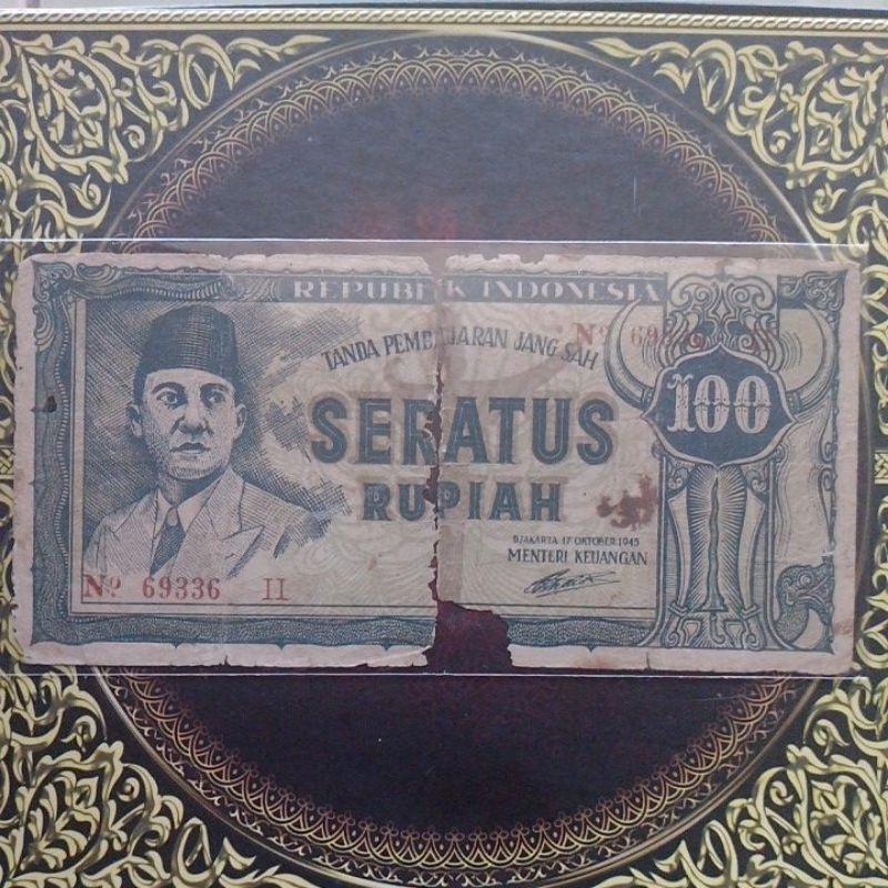 Uang ORI Sukarno 100 rupiah keris 1945 vg cuil