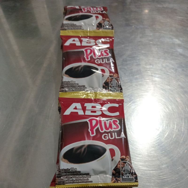 

KOPI ABC Plus gula 18g{1 renteng 10sacet}