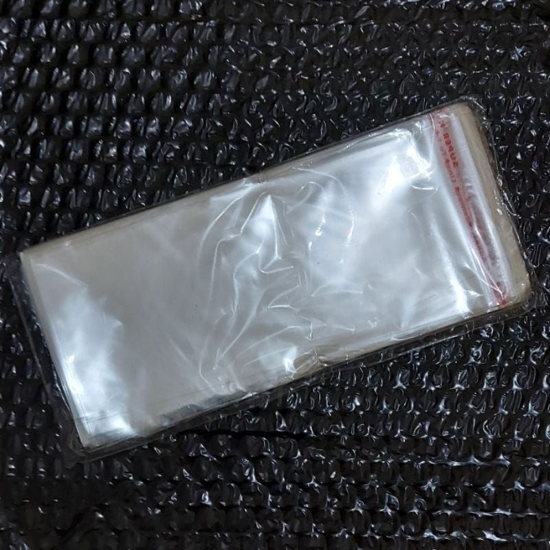 Plastik Opp Lem Plastik Uang Ukuran 7 x 16 Cm Dan 8 x 16 Cm Warna Bening Per Pack Isi 100 Pcs