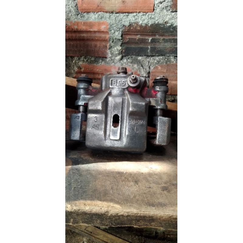 cabutan aisin caliper baleno lama97dan00
