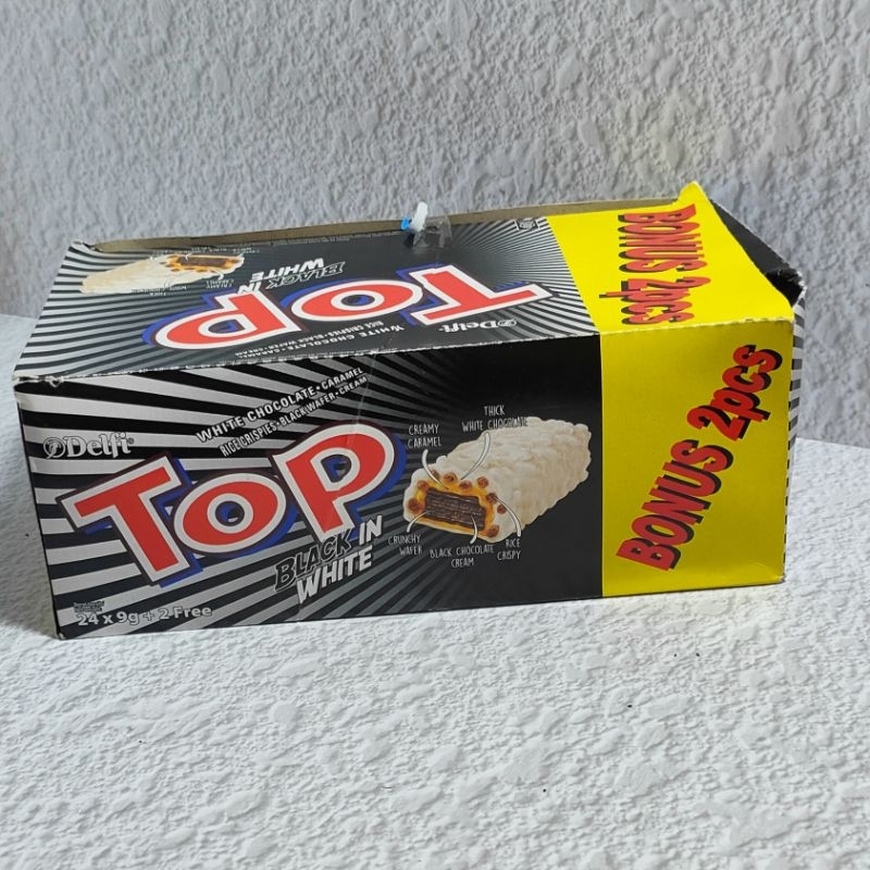 

[1 box] Top Delfi Black in White Wafer Hitam dengan Krim, Karamel, dan beras Krispi salut Cokelat Putih Termurah Terlaris Harga Grosir Terlengkap