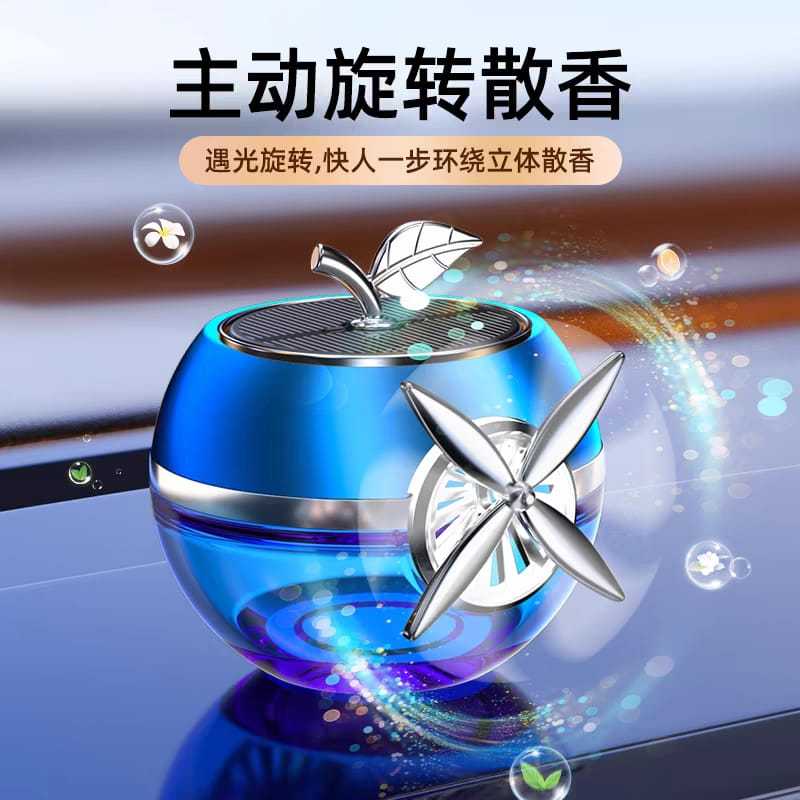 Parfum pajangan dashboard mobil motif apple kipas tenaga surya car ( Sukses )