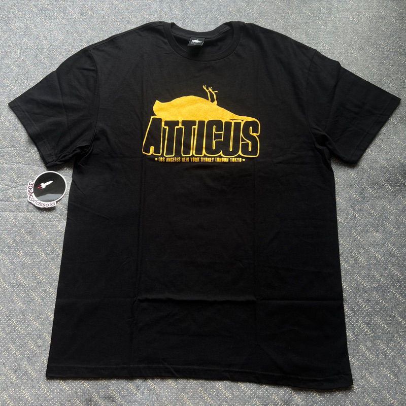 Atticus clothing waring t shirt